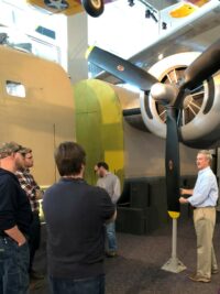 Craig and students tour a museum during a recent course.